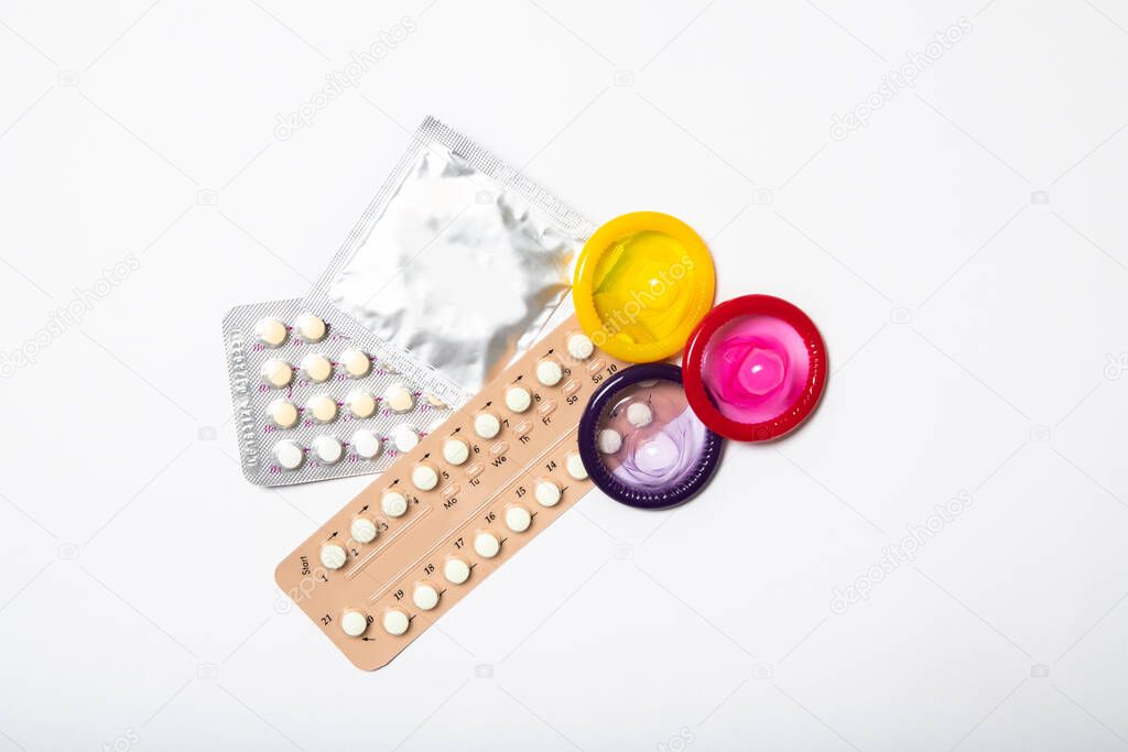 Contraceptives on a white background. Safe sex
