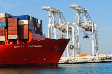 Alameda, CA - March 9, 2015: Oakland Oakland Container Shipyard, San Francisco Bay, the Hamburg Sud ship 