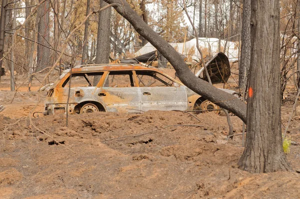 Destruction of the forest, vehicles and damage to homes caused by the California Butte fire