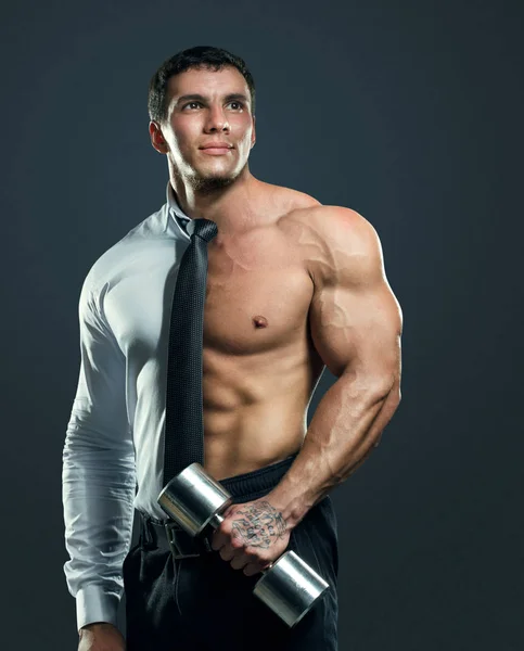 Athlete businessman showing his internal strength — Stock Photo, Image