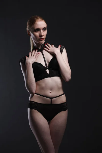 Sexy girl in underwear posing in studio — Stock Photo, Image