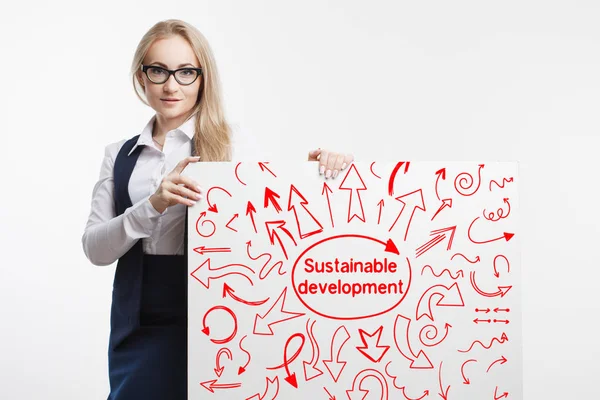 Technology, internet, business and marketing. Young business woman writing word: Sustainable development. — Stock Photo, Image