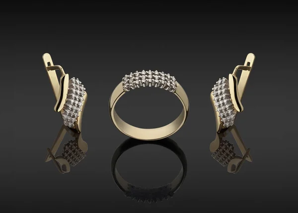 Złoty pierścień i kolczyki z brylantami — Zdjęcie stockowe