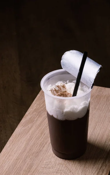 Chocolate pudding with straw — Stock Photo, Image