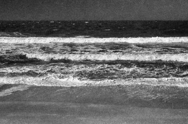 Vintage black and white grainy film concept. Seascape with empty