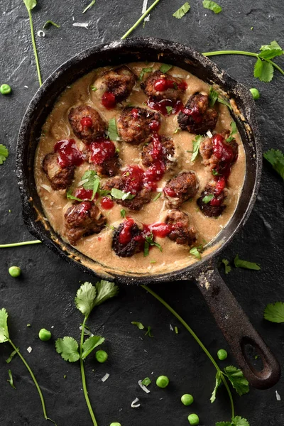 Scandinavian comfort food. Homemade meatballs in creamy gravy wi