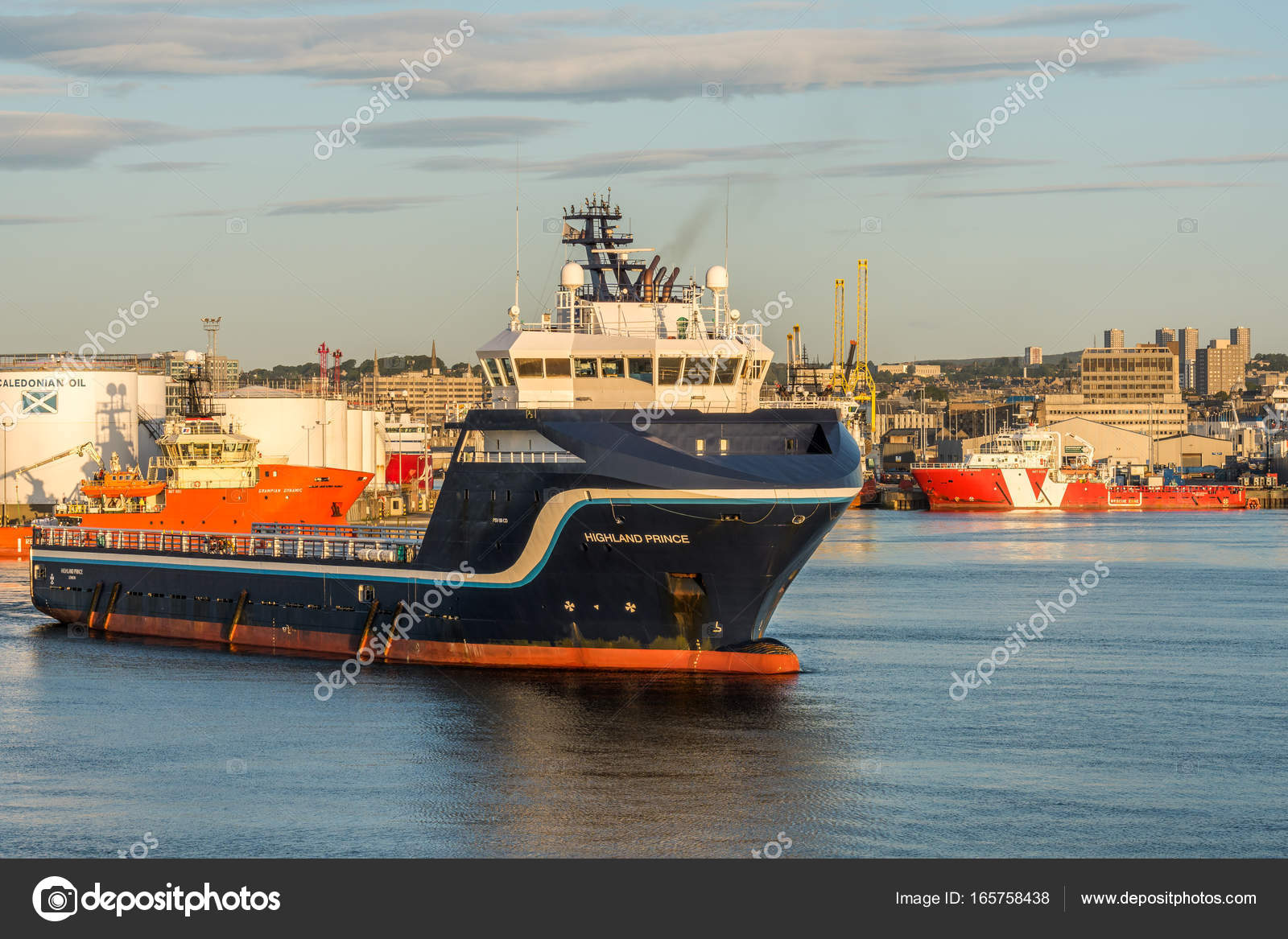 Aberdeen Harbour Basin And The Oil Tug Highland Prince Stock