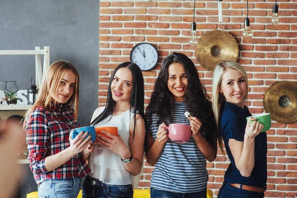 Group beautiful young people enjoying in conversation and drinking coffee, best friends girls together having fun, posing emotional lifestyle people concept.