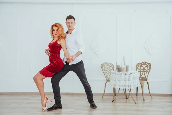 Young Beautiful Woman Red Dress Man Dancing Isolated White Background — Stock Photo, Image