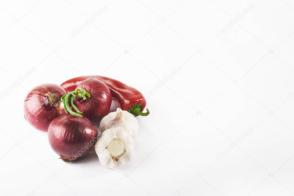 blue onion garlic and hot red pepper isolated on white background.