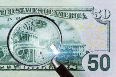 50 bize bir büyüteç altında dolar. yakın çekim