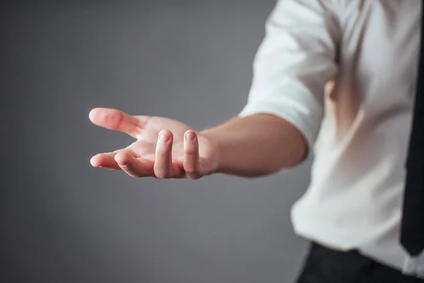 Young Businessman Showing Empty Hands Ready Fill Your Design — Stock Photo, Image