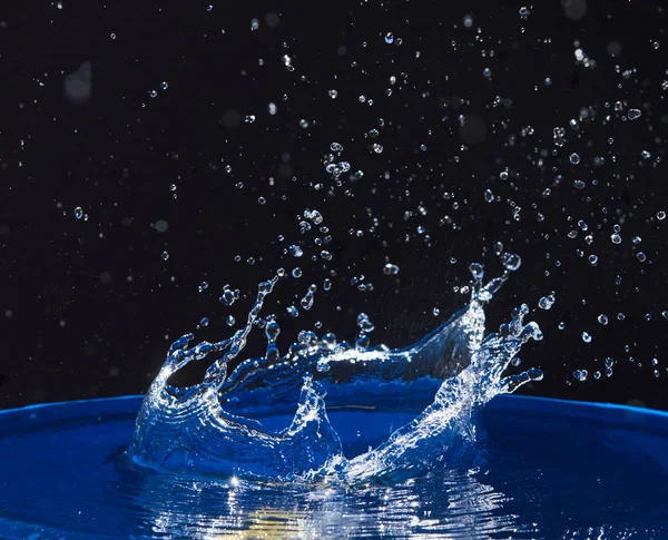 Splash Water Crown Blue Surface Black Background — ストック写真