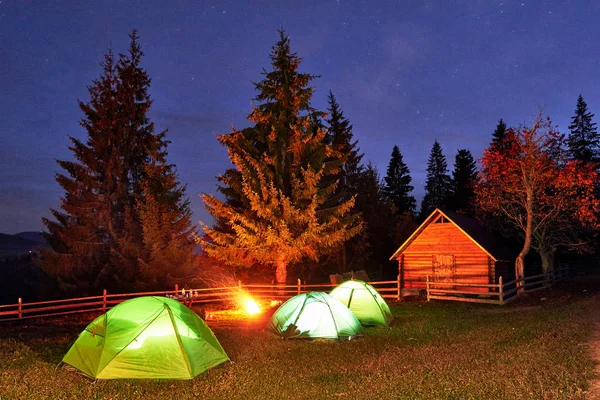 Night Camping Tourist Have Rest Campfire Illuminated Tent Wooden House — Stock Photo, Image