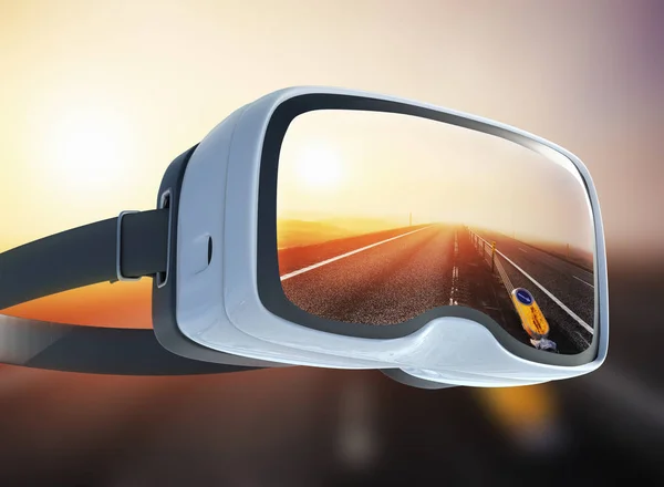 Virtual reality headset, double exposure, along the road at sunset