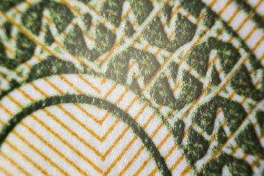 Usa parası mikroskop altında kısmen odak dışı, merkez üzerinde odak noktası.