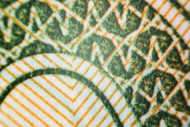 Usa parası mikroskop altında kısmen odak dışı, merkez üzerinde odak noktası.