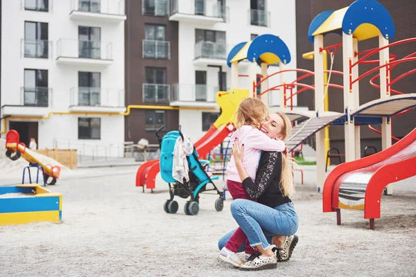 Happy Mother Pushing Laughing Son Swing Park — Stock Photo, Image