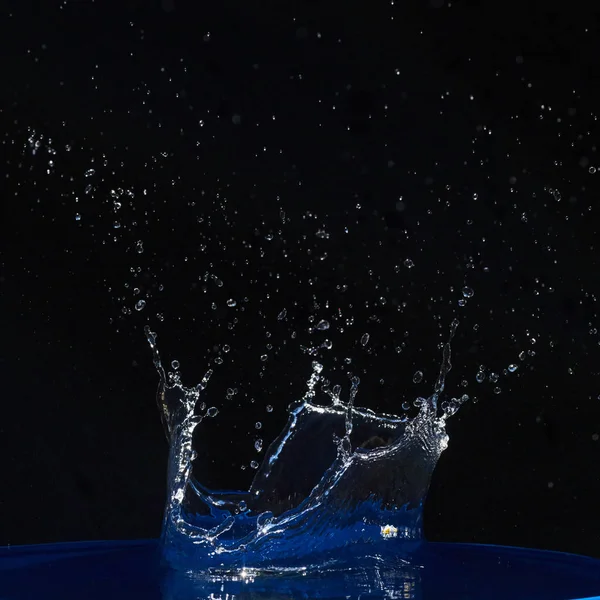 Splash Water Crown Blue Surface Black Background — ストック写真