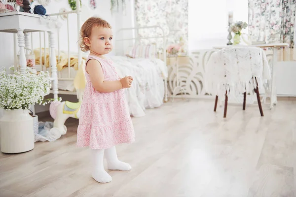 Beautiful Little Girl Playing Toys Blue Eyed Blonde White Chair — Stock Photo, Image