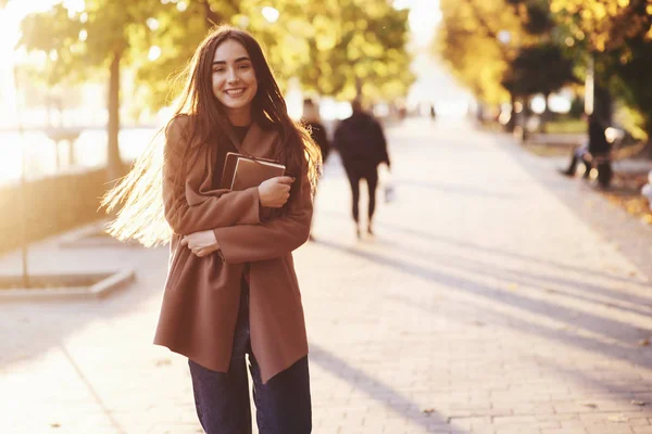 Front View Young Smiling Pretty Brunette Girl Standing Holding Small — 스톡 사진