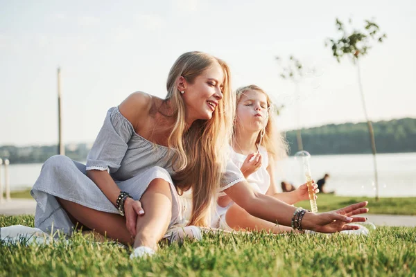 Wonderful Girl Child Makes Bubbles Her Mom Park — Stock Photo, Image