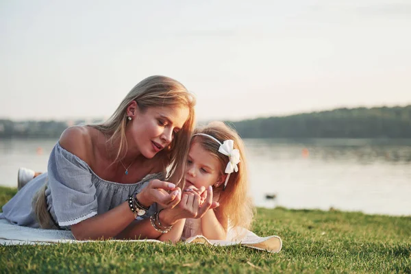 Attractive Happy Young Mother Lying Her Cute Daughter Grass Park — Stock Photo, Image