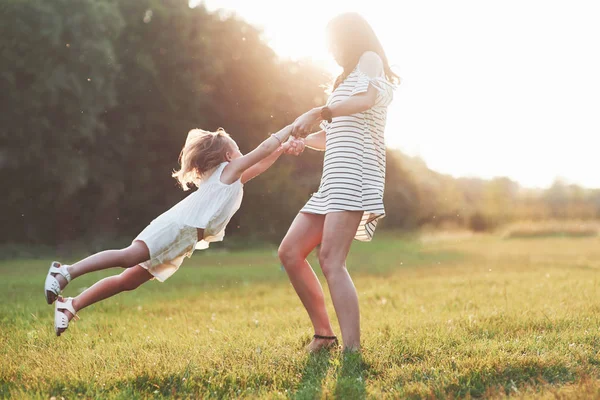 Holding Hands Spinning Photo Young Mother Her Daughter — Stock Photo, Image