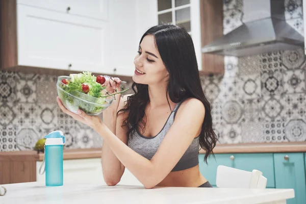 Young Woman Eating Healthy Salad Cherry Tomatoes Kitchen Fitness Session — 스톡 사진