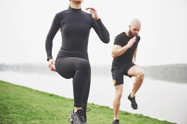 Young Couple Enjoys Playing Sports Morning Open Air Warm Exercise — 图库照片