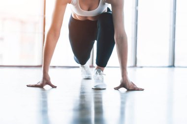 Active girl in fitness gym. Concept workout healthy lifestyle sport.