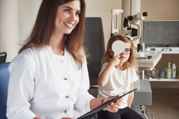 Doctor Little Patient Sits Conduct Test Acuity Vision — 스톡 사진