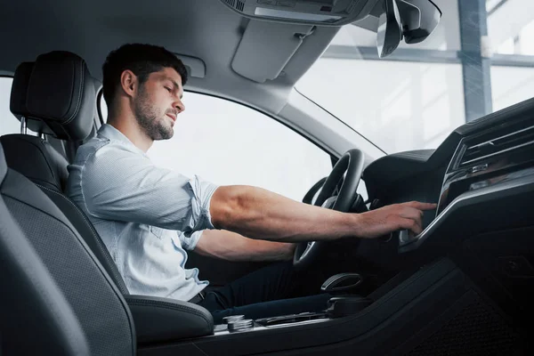 Young Man Sits Newly Bought Car Holding His Hands Rudder — Stock Photo, Image