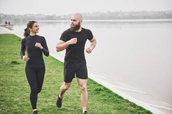 Couple Jogging Running Outdoors Park Water Young Bearded Man Woman — Stok fotoğraf