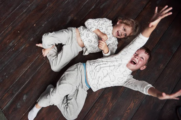 Two Children Brother Sister Pajamas Play Together — Stock Photo, Image