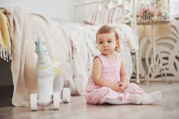 Beautiful Little Girl Playing Toys Blue Eyed Blonde White Chair — Stock Photo, Image