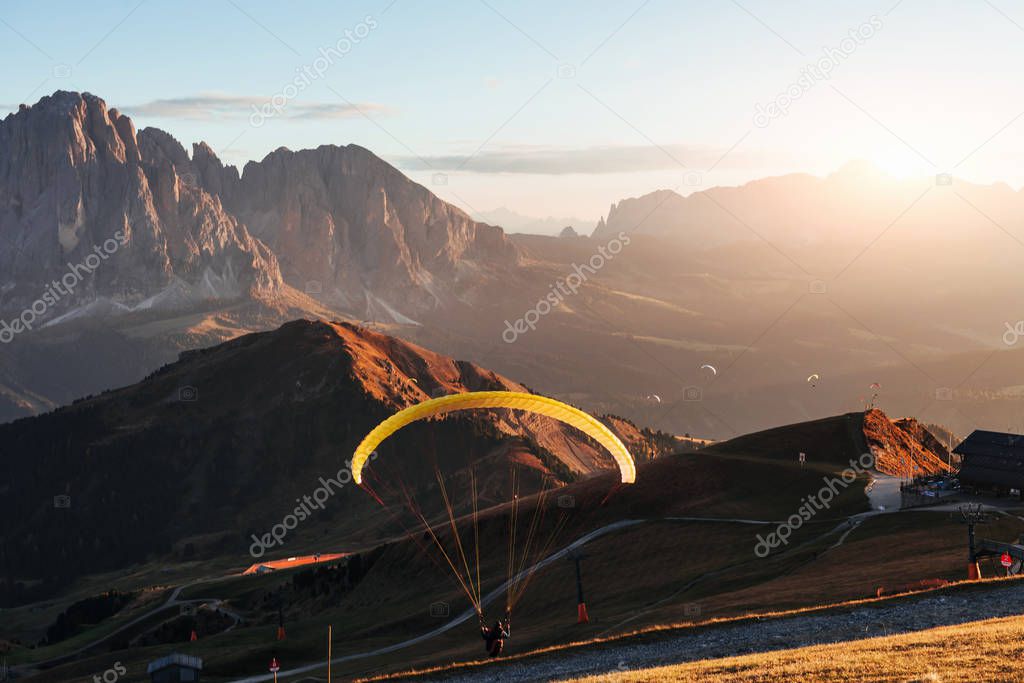 Sports of paraglinding in the beautiful mountains in Italy.