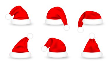 Bir çift Noel Baba şapkası. Beyaz arka planda gerçekçi kırmızı Noel Baba şapkaları. Kostüm ve maske için şirin Noel Baba şapkası, tasarım elementi