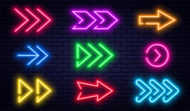 Set of glowing neon arrows. Glowing neon arrow pointers on brick wall background. Retro signboard with bright neon tubes in red, yellow, purple and blue colors clipart