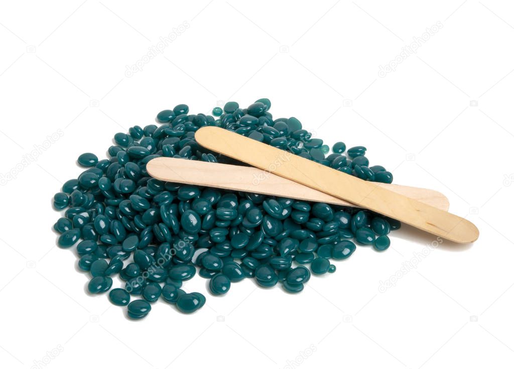 spa wax for depilation in granular form on the white background