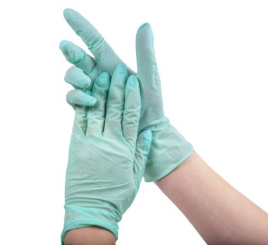 Elindeki yeşil lastik eldiven beyaza izole edilmiş.