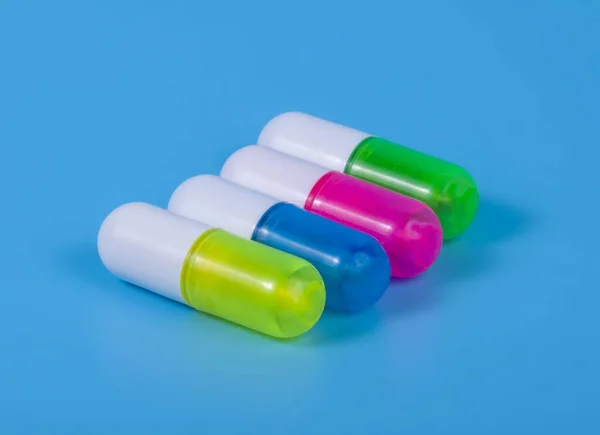 Pílulas Diferentes Fundo Azul — Fotografia de Stock