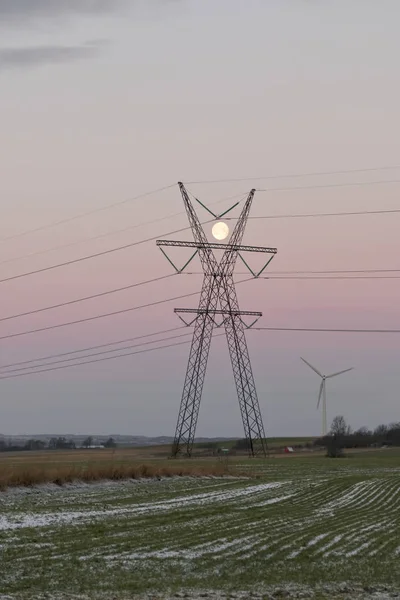 Full Moon Behind the Power Pylon — Stock Photo, Image