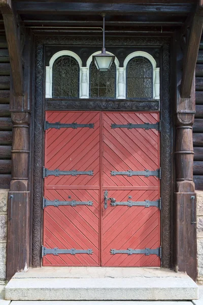 Červené dvojité dveře — Stock fotografie