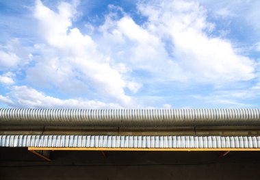 roof top pattern over blue sky background