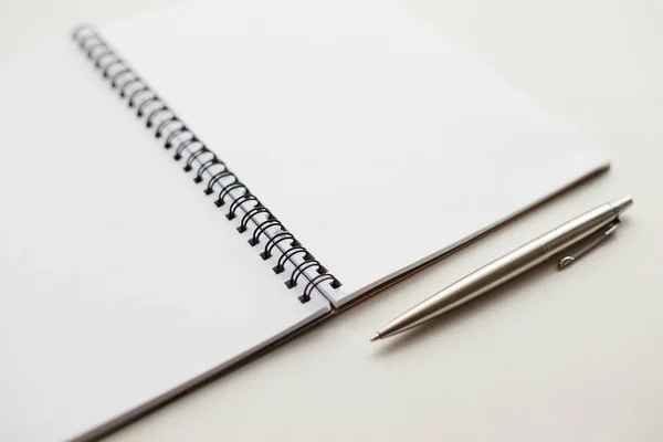 Notebook planner with pen for business on table white