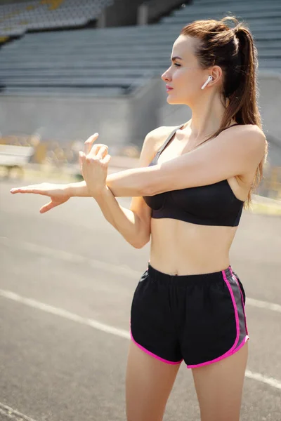 Sexy sporty woman during outdoor workout. Beautiful fit Girl in sport wear. Weight Loss. Healthy lifestyle. Sporty healthy female.