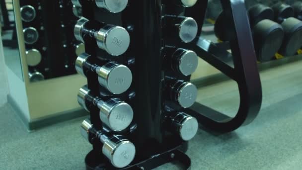 Vertical stand with dumbbells — Stock Video