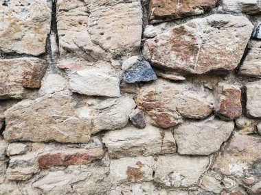 Taşların arka planı. Dış yüzey taş duvar, arka plan iyi desenli..
