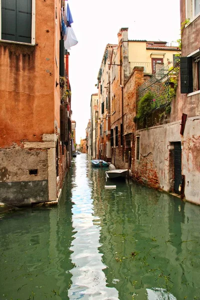A quiet canal without any people in Venice, Italy.